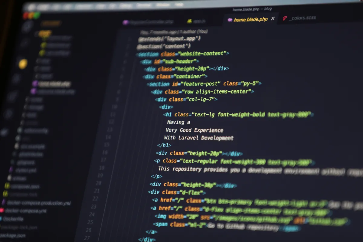 Dark-themed code editor screen with syntax-highlighted markup, representative of dark UI design work