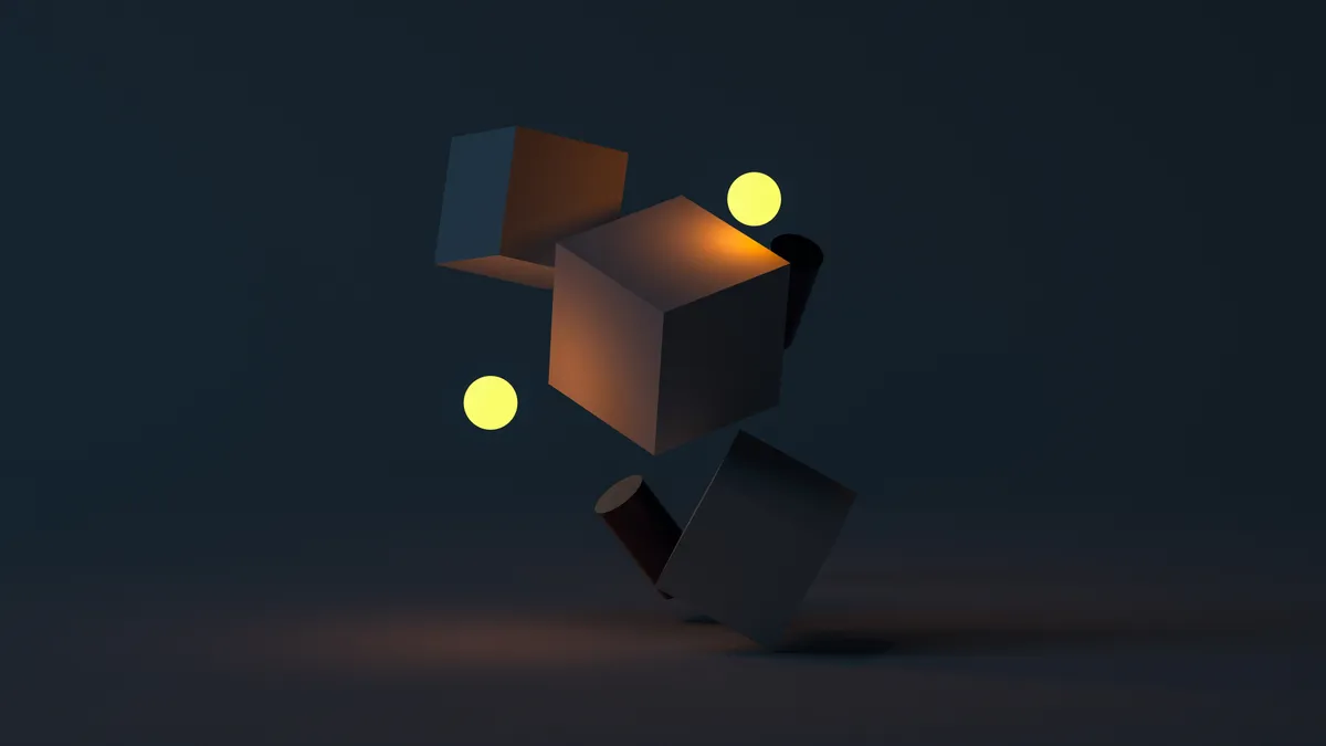 Dark 3D render of tilted cubes and two glowing yellow spheres floating above a soft shadowed floor