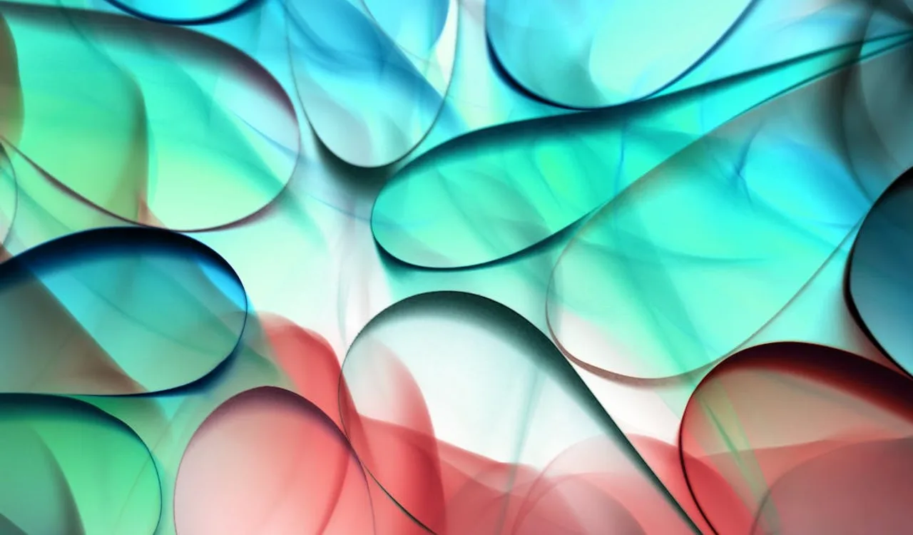 Vibrant red, green, and blue abstract shapes illustrating CSS animation principles for web motion design