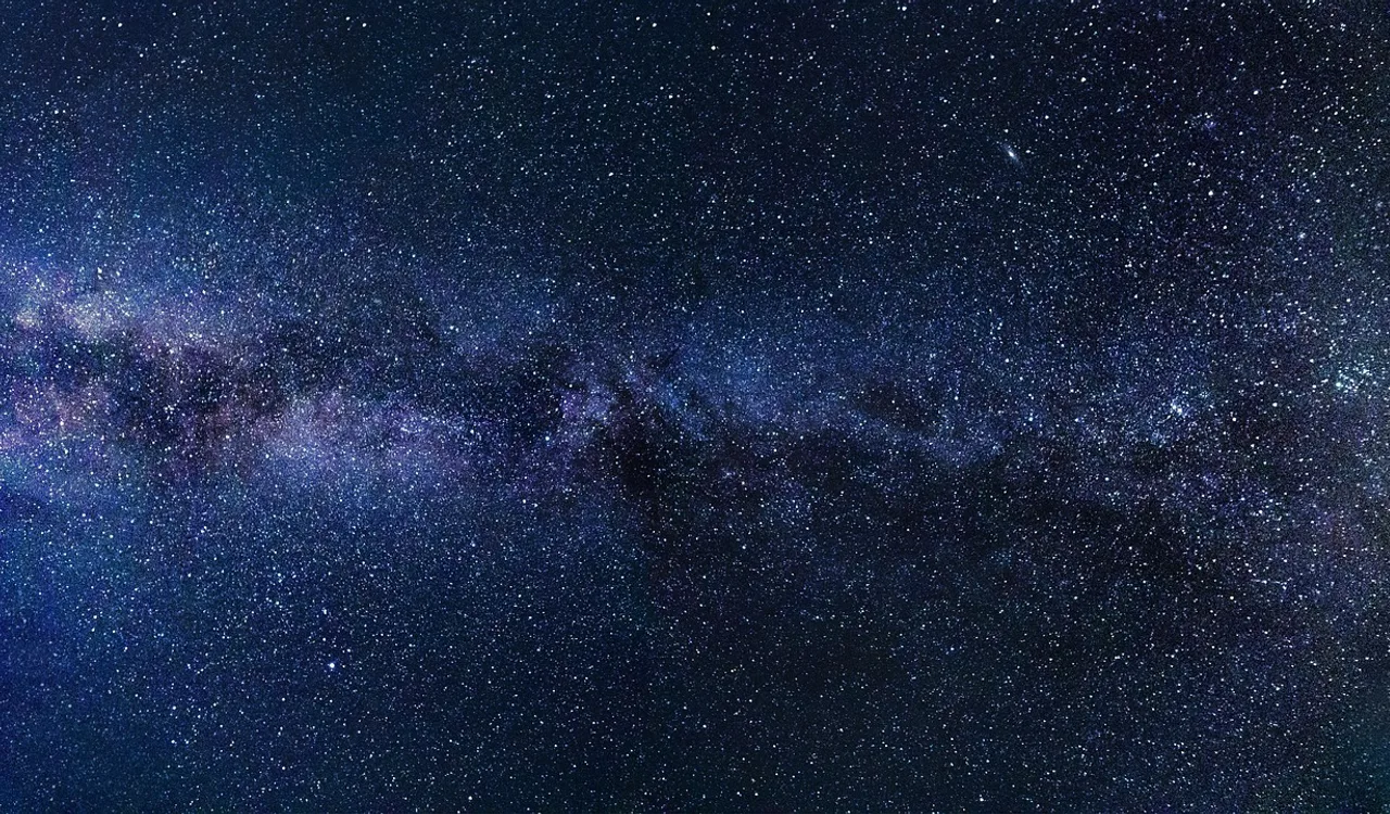 Milky Way night sky with vivid color gradient as UI color palette generator inspiration for digital design