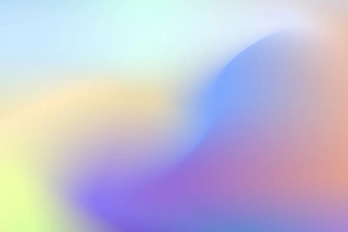 A smooth gradient shifting from pale yellow through blue into purple