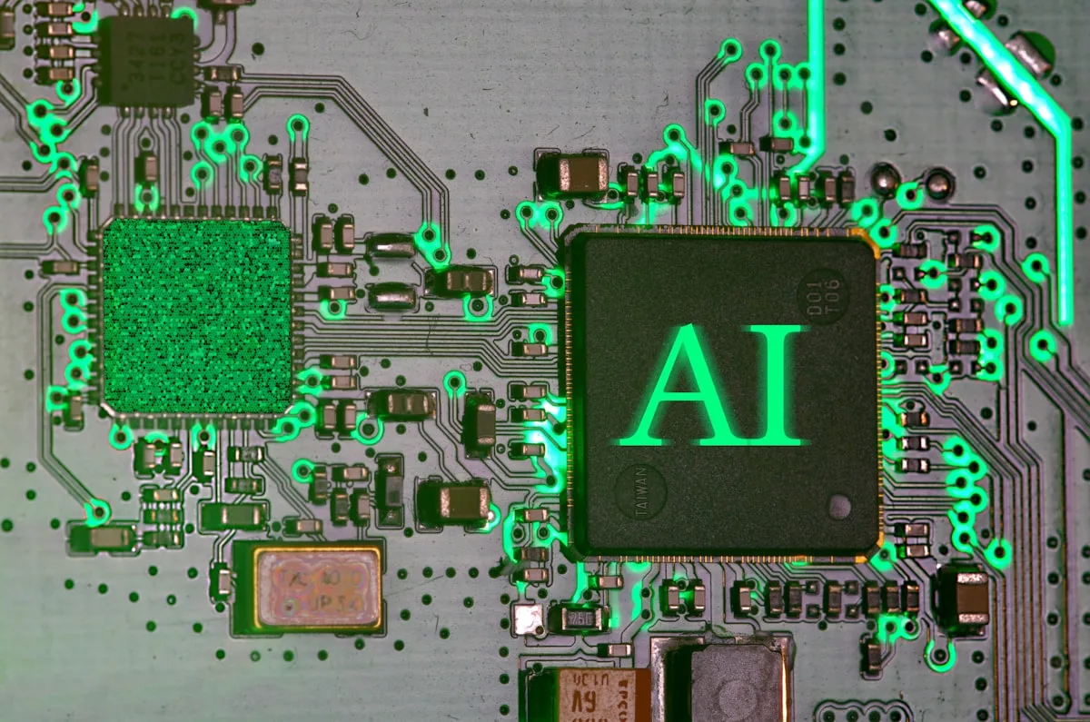A glowing blue AI microchip on a detailed circuit board, symbolizing the model behind Claude Design