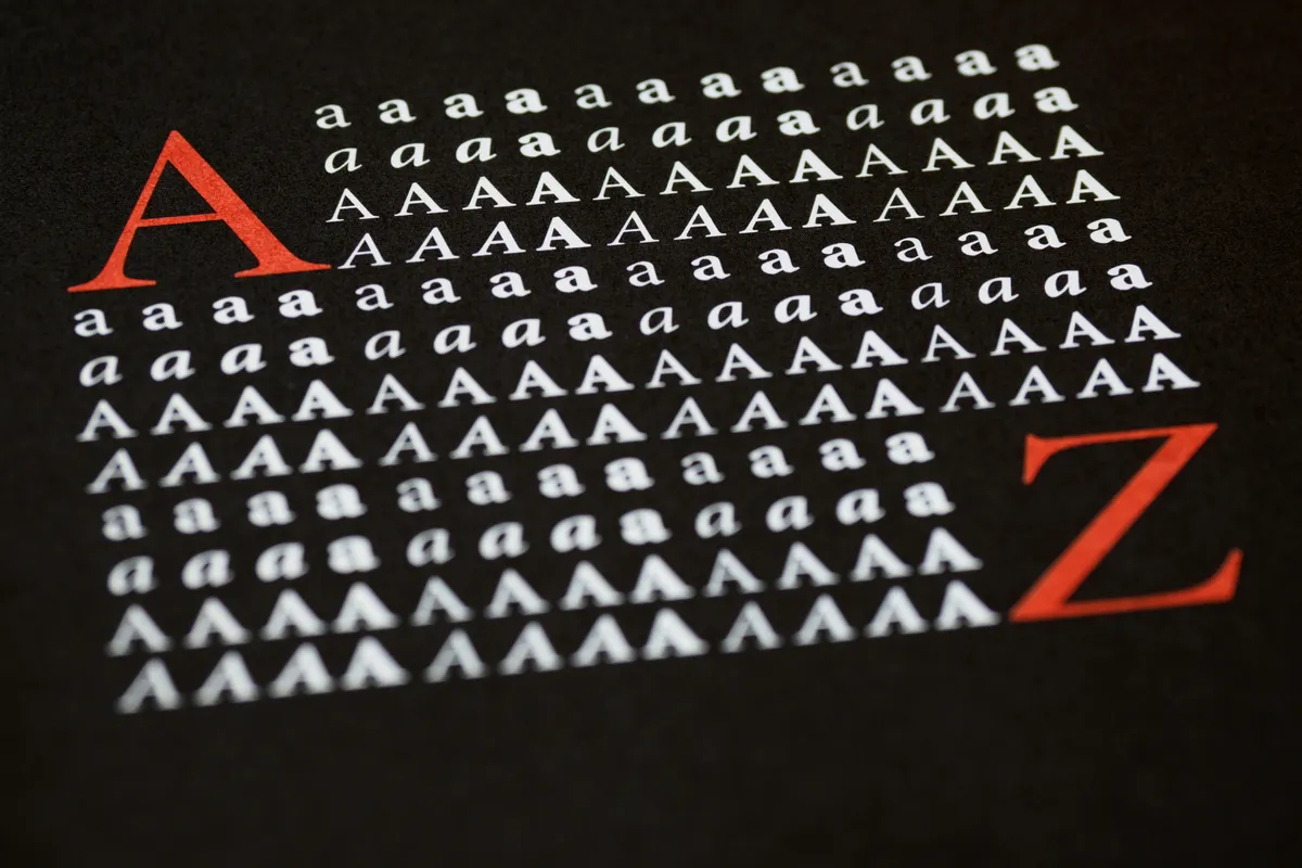 Serif letterforms in tight focus with the rest of the line falling to blur
