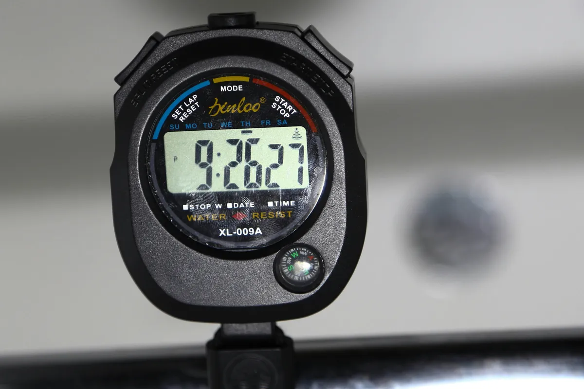 A stopwatch caught mid-count in close focus