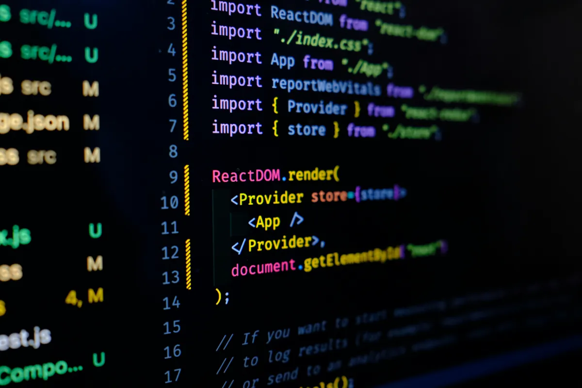 React code on a dark screen showing ReactDOM.render wrapping an App component