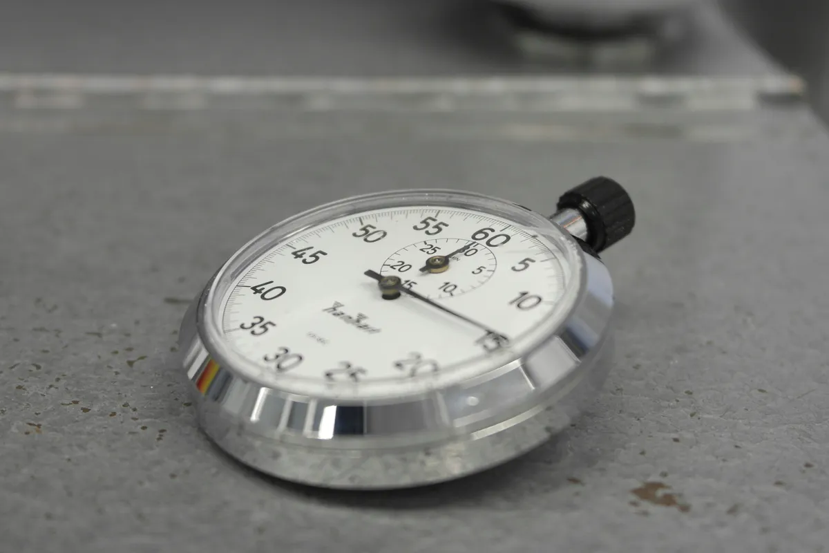 A stopwatch stopped at fifteen