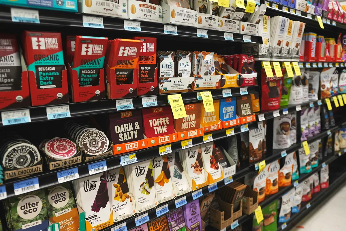 A store aisle crammed with unlike items competing for the same glance