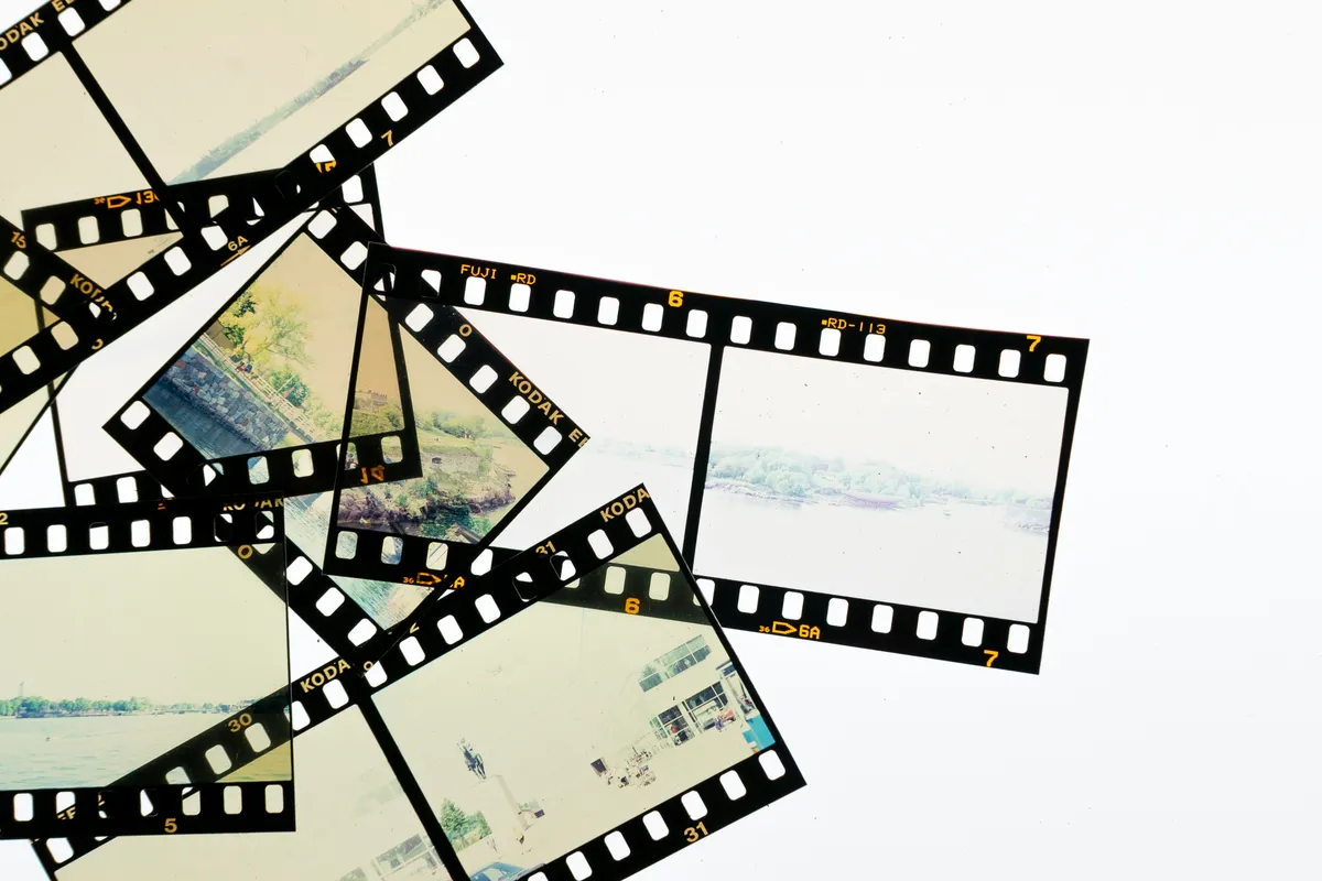 Overlapping rolls of slide film with the frame numbers still readable