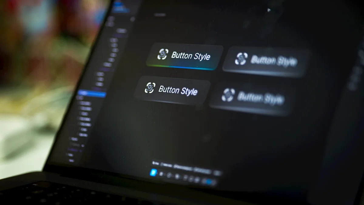 Laptop screen showing UI button style design frames