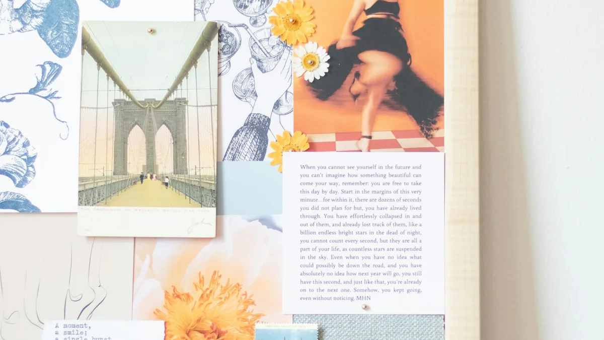 Inspiration wall of pinned photos and pressed flowers