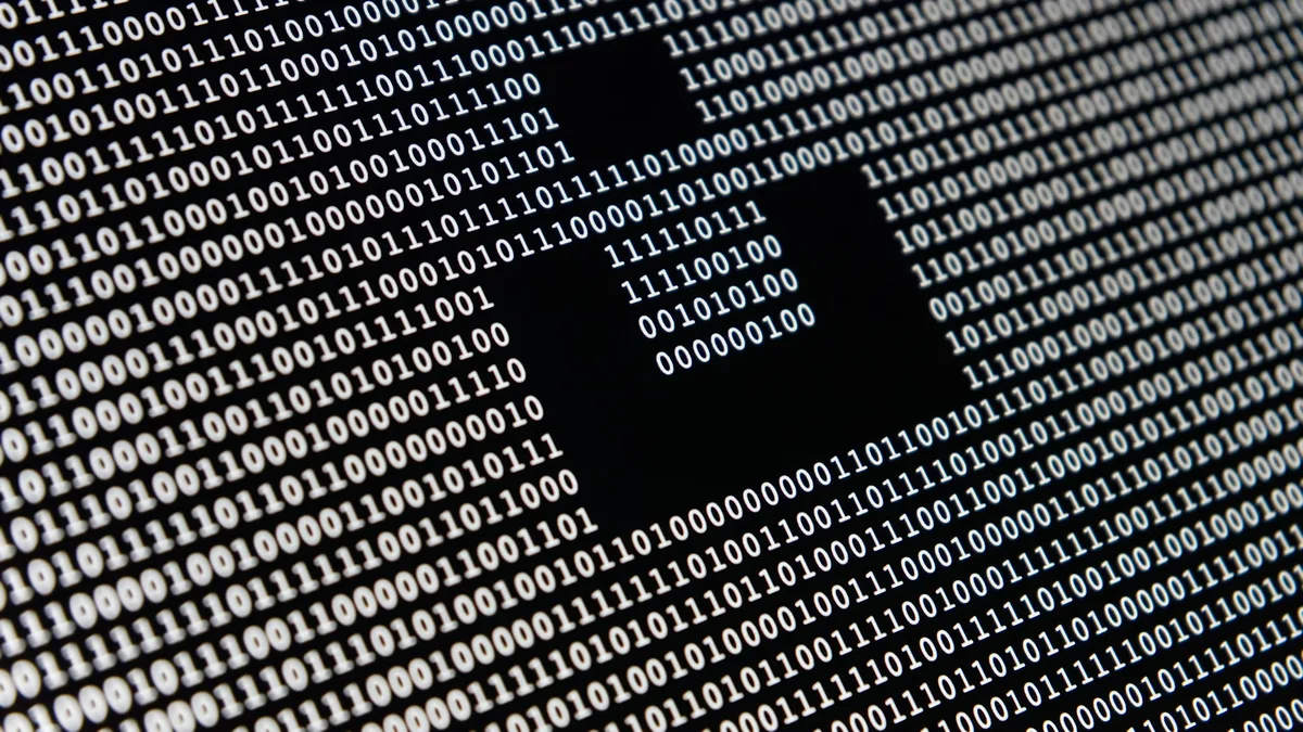 Close-up of a computer screen displaying rows of numeric data