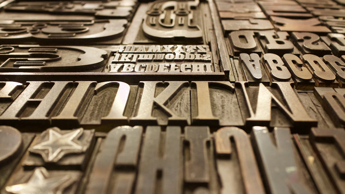 Close-up of assorted metal letterpress type blocks showing varied letterforms