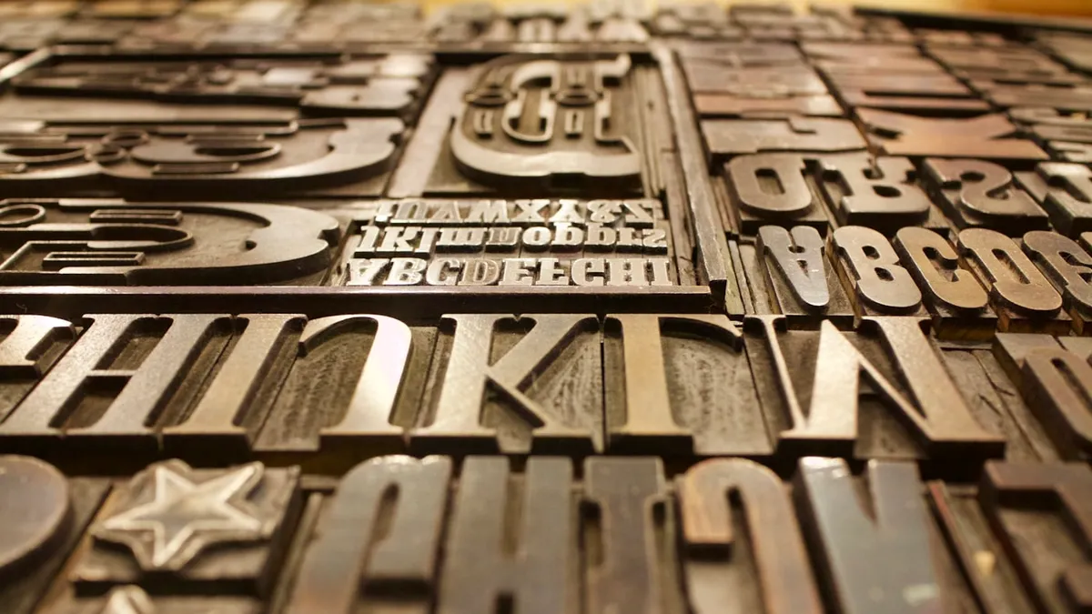 Close-up of mixed typography letters illustrating scale and contrast in type