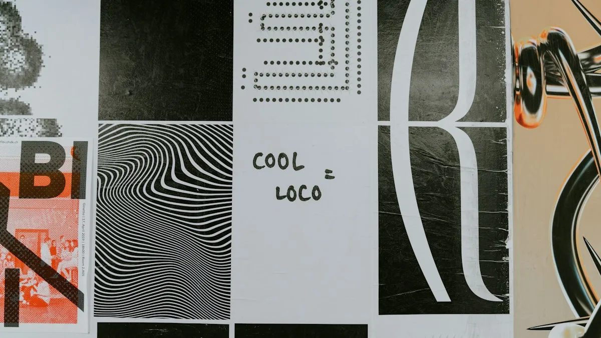 Close-up of a wall of black, white and orange type posters set in mixed typefaces and sizes